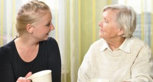 Elderly woman with her granddaughter