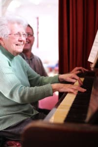 Gwenda playing the piano